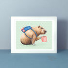 A poster featuring a capybara drinking coffee