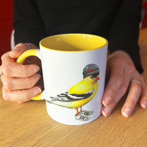 Goldfinch wearing sneakers Mug