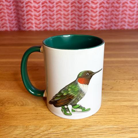 Hummingbird wearing sneakers Mug