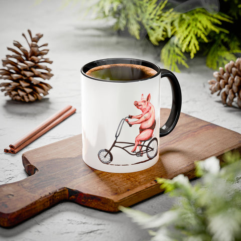 Pig riding a bike mug