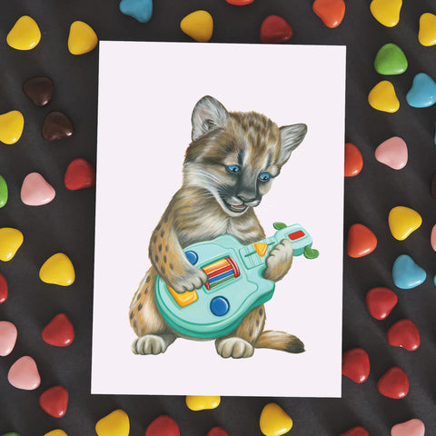 Baby Cougar playing guitar - Greeting Card