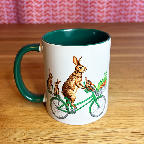 Rabbits Riding a Bike Mug