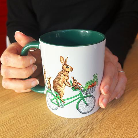 Rabbits Riding a Bike Mug