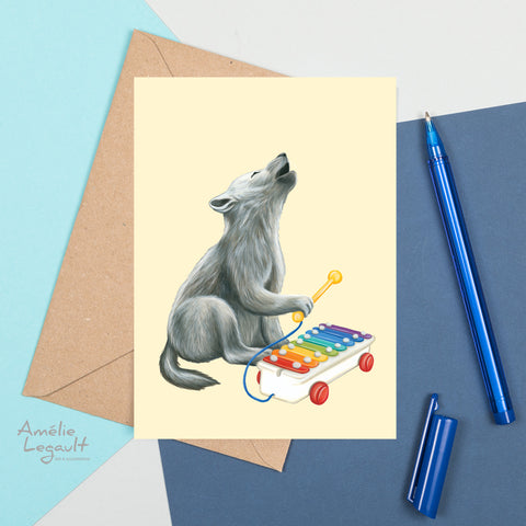 Baby Wolf playing xylophone- Greeting Card