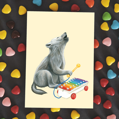 Baby Wolf playing xylophone- Greeting Card