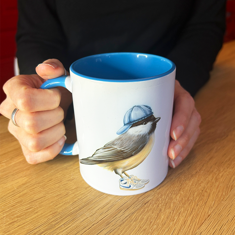 Chickadee wearing sneakers Mug