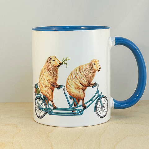 Sheep riding a Bike Mug