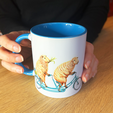 Sheep riding a Bike Mug