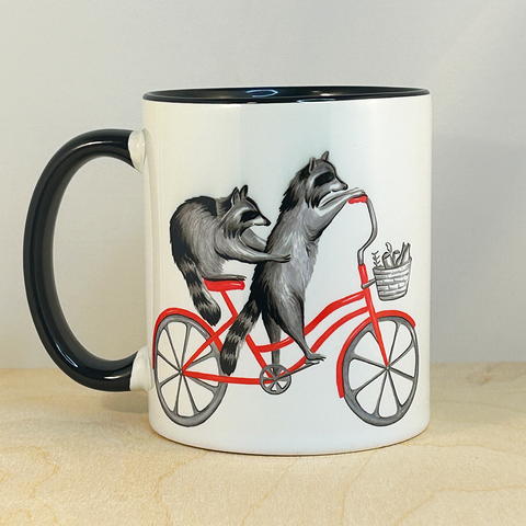 Raccoons riding a Bike Mug