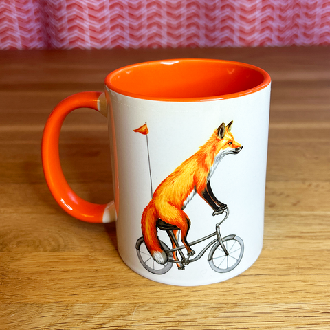 Fox riding a Bike Mug