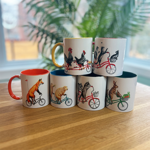 Rooster, hen and chicks riding a tandem bicycle Mug