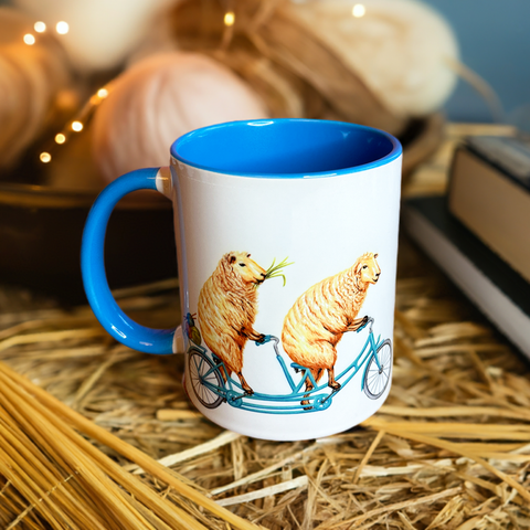 Sheep riding a Bike Mug