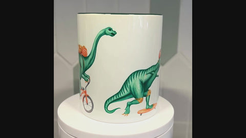 Dinosaur Trio riding bikes mug